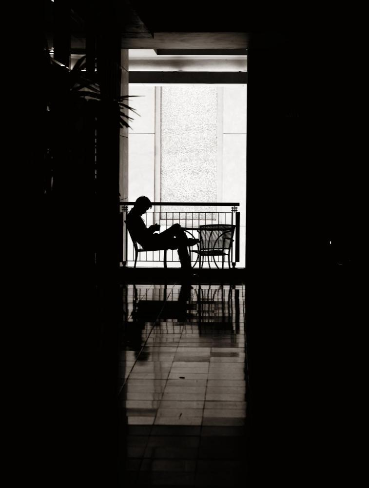 Reading at cafe — low maintenance confident